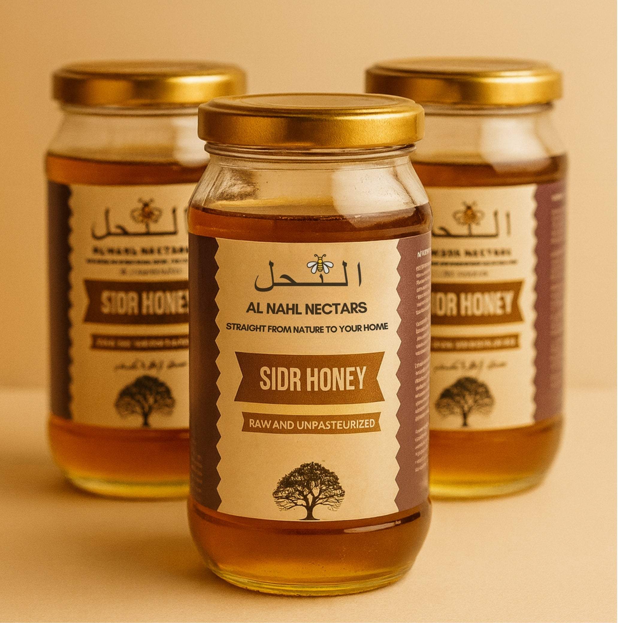 Three jars of Sidr Honey from Al Nahl Nectars on a beige background